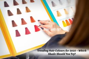 A stylist at TONI & GUY Coimbatore showing trending hair colouring shades for 2025 in a salon colour chart