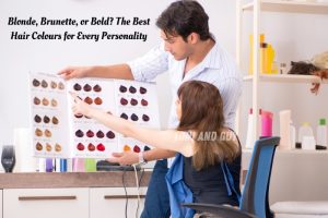 A stylist at TONI & GUY Coimbatore helping a client choose from a range of vibrant hair colour shades